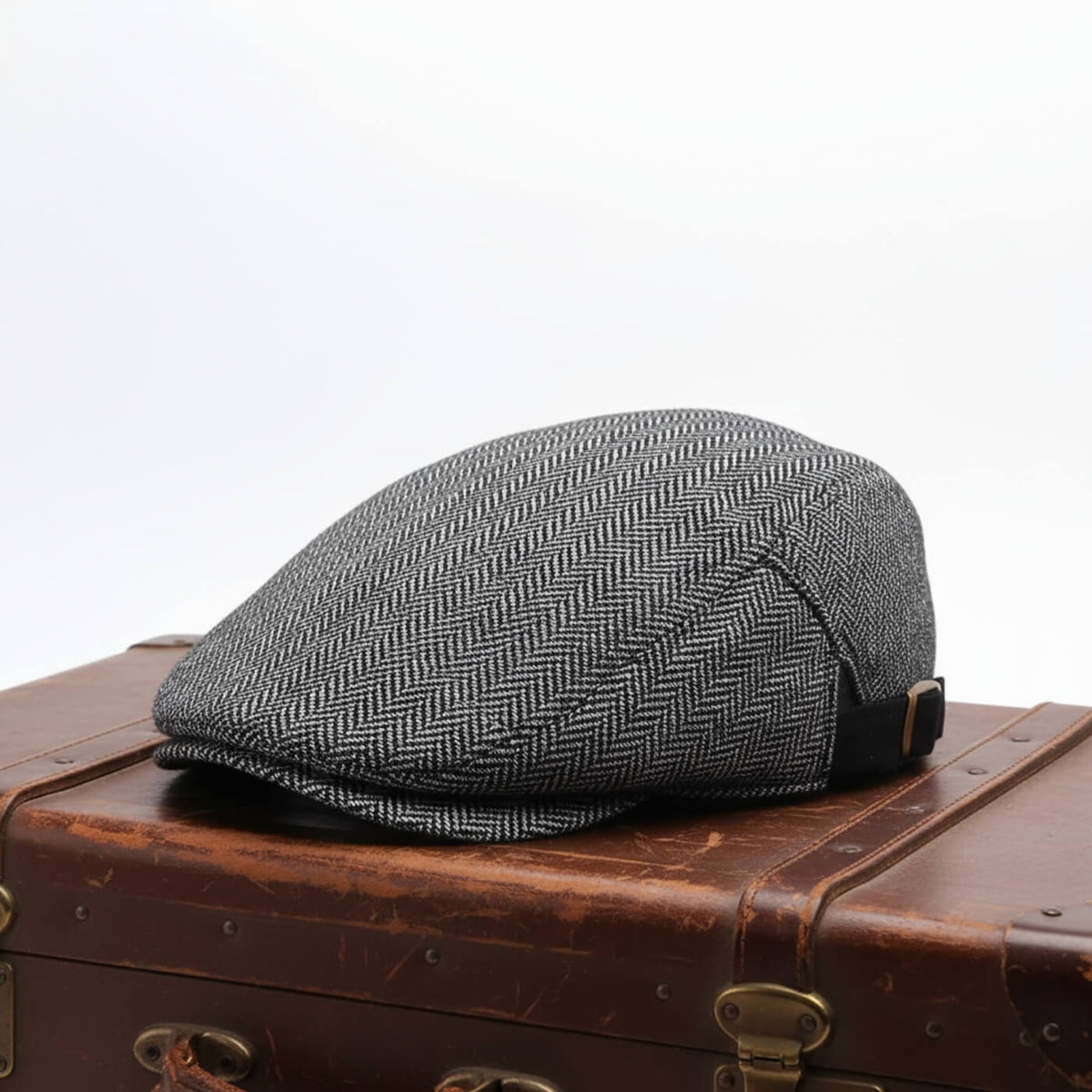 Herringbone flat cap in a wool blend — SAXMUNDHAM